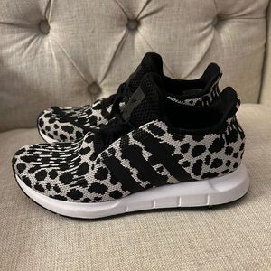 Spotted Adidas Swift Run shoes